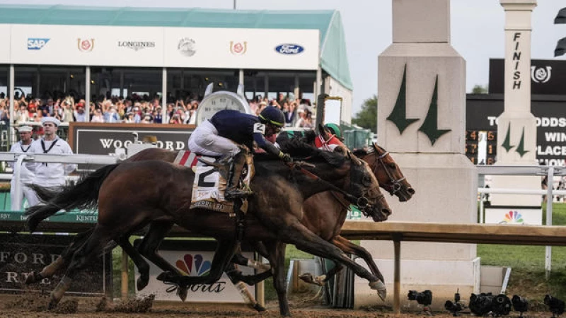 "Thrilling Photo Finish: Mystik Dan Emerges Victorious in 150th Kentucky Derby"